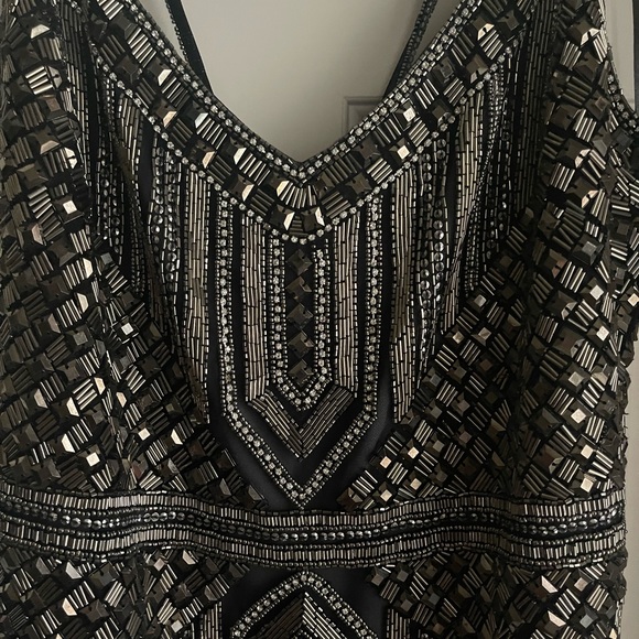 Theia gunmetal formal gown. A few beads missing on hem but in good condition. - Picture 2 of 2